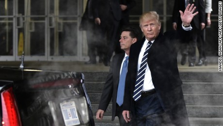 US President Donald Trump makes his way to his limousine following a visit to the Central Intelligence Agency (CIA) in Langley, Virginia, on January 21, 2017.
Trump told the CIA Saturday it had his fervent support as he paid a visit to mend fences after publicly rejecting its assessment that Russia tried to help him win the US election. &quot;I am with you 1,000 percent,&quot; Trump said in a short address to CIA staff after his visit to the agency headquarters in Virginia.
