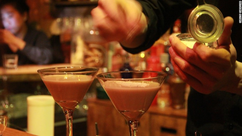  A bartender in Capital Spirits prepares the baijiu-based  "Moutai Coco Cream."