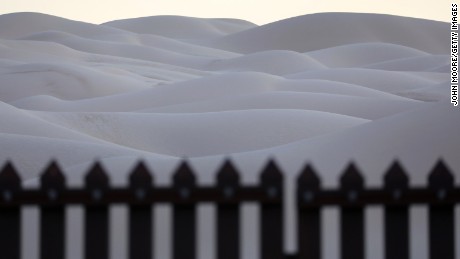 This 15-foot border fence that sits atop sand dunes at the Imperial Sand Dunes in California is known as the &quot;floating fence.&quot; It moves with the sand as winds shift. According to Border Patrol agents, immigrants and drug smugglers attempt to cross here daily. 