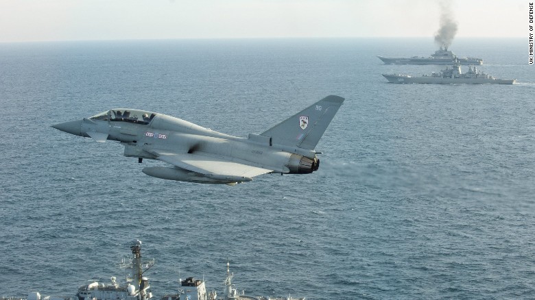 A Royal Air Force Typhoon fighter from Britain Quick Reaction Alert force flies near the Russian aircraft carrier Admiral Kuznetsov on Wednesday, January 25, 2017.