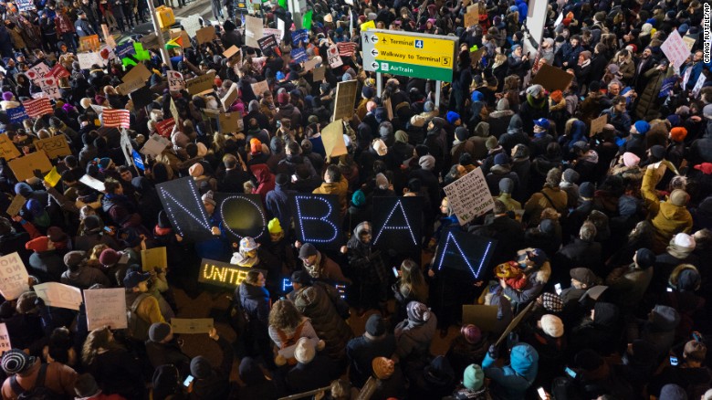 Protesters assemble at John F. Kennedy International Airport in New York, Saturday, Jan. 28, 2017, after earlier in the day two Iraqi refugees were detained while trying to enter the country. On Friday, Jan. 27, President Donald Trump signed an executive order suspending all immigration from countries with terrorism concerns for 90 days. Countries included in the ban are Iraq, Syria, Iran, Sudan, Libya, Somalia and Yemen, which are all Muslim-majority nations. [AP Photo/Craig Ruttle)