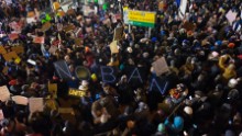 Protesters assemble at John F. Kennedy International Airport in New York, Saturday, Jan. 28, 2017, after earlier in the day two Iraqi refugees were detained while trying to enter the country. On Friday, Jan. 27, President Donald Trump signed an executive order suspending all immigration from countries with terrorism concerns for 90 days. Countries included in the ban are Iraq, Syria, Iran, Sudan, Libya, Somalia and Yemen, which are all Muslim-majority nations. (AP Photo/Craig Ruttle)