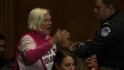 Protester shouts after Sessions approval