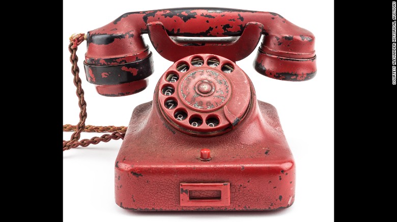 Hitler&#39;s phone, which was originally black, was painted red and engraved with his name and a swastika.