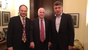 Vladimir Kara-Murza, left, and his now-deceased friend, Boris Nemtsov, right, visit Sen. John McCain in Washington in June 2013.