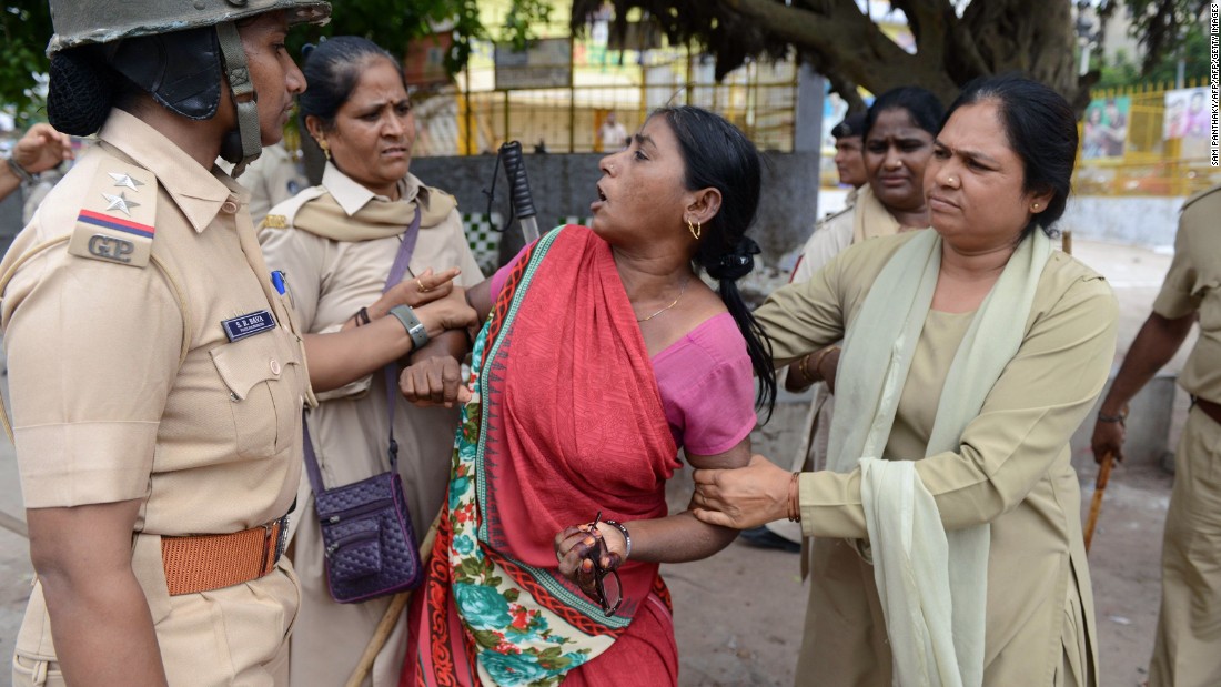 A member of the Dalit caste community is detained during a protest against an earlier attack on Dalits in July, 2016.