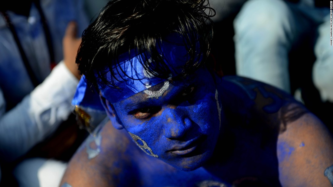 A supporter of the Bahujan Samaj Party (BSP) attends an election rally for leader Mayawati in February, 2017. Millions of voters in Uttar Pradesh, India&#39;s biggest state, start to head to the polls on February 11.