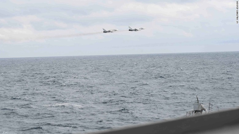 A pair of Russian Su-24 jets pass in close proximity to the USS Porter on February 10, 2017.