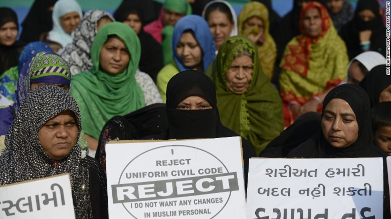 Indian Muslim women participate in a rally to oppose the Uniform Civil Code (UCC) that would outlaw the practice of &quot;triple talaq&quot; in Ahmedabad on November 4, 2016. I
