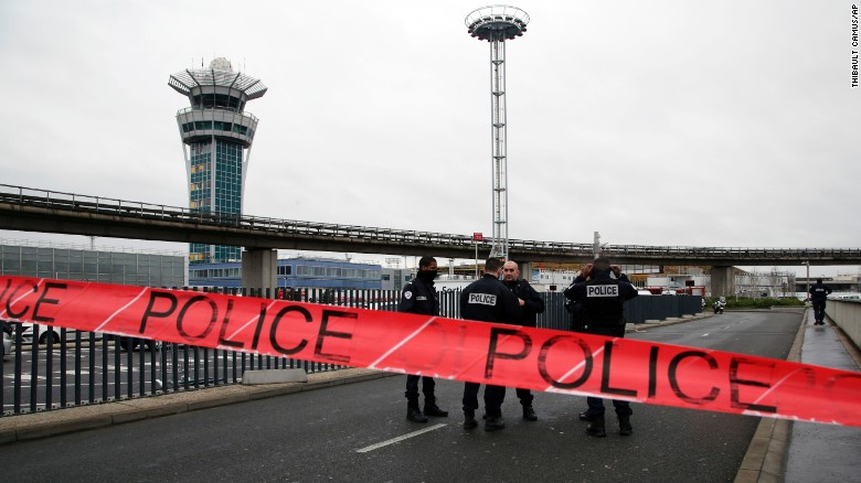 Police cordon off access to Paris Orly Airport after a man was shot and killed on Saturday, March, 18, after he tried to seize a soldier&#39;s weapon.