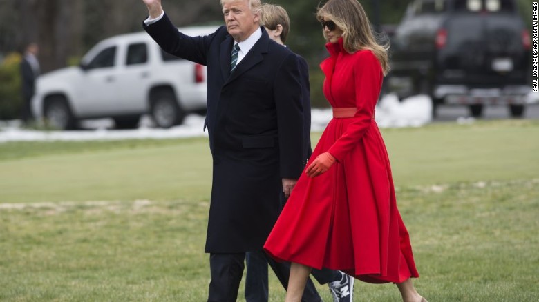 USPresident Donald Trump, First Lady Melania Trump and their son, Barron, walk to Marine One prior to departing from the South Lawn of the White House in Washington, DC, Friday.