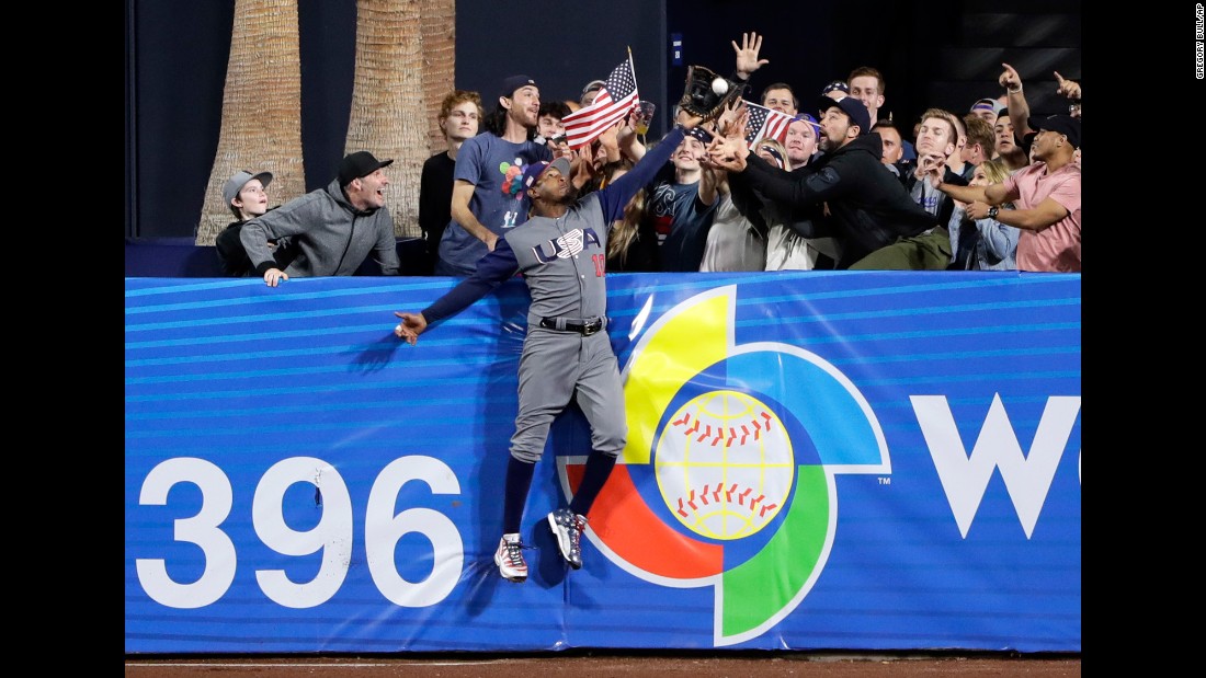 US outfielder Adam Jones steals a home run during a second-round game at the World Baseball Classic on Saturday, March 18. Manny Machado, the Dominican player who hit the ball, &lt;a href=&quot;http://bleacherreport.com/articles/2698807-adam-jones-robs-manny-machado-of-home-run-at-world-baseball-classic&quot; target=&quot;_blank&quot;&gt;tipped his cap to Jones,&lt;/a&gt; his teammate with the Baltimore Orioles. The Americans advanced to the semifinals with a 6-3 victory.