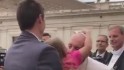  Little girl tries to steal Pope&#39;s hat