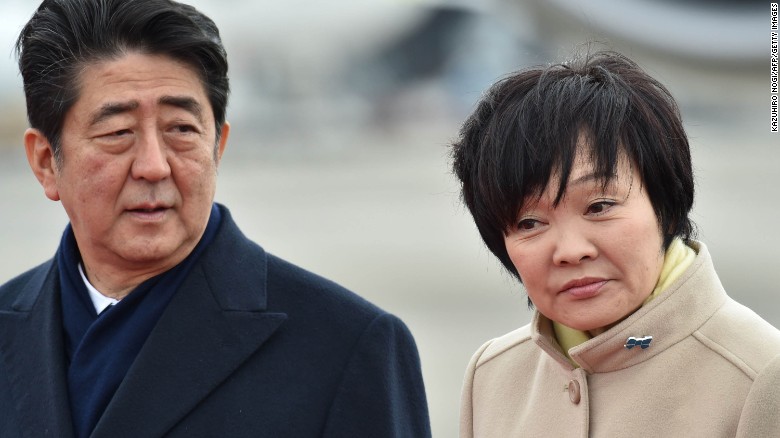 Japan&#39;s Prime Minister Shinzo Abe and his wife Akie see off Emperor Akihito and Empress Michiko as they leave for Vietnam from Tokyo&#39;s Haneda Airport on February 28.