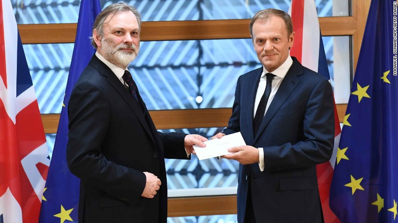 Britain&#39;s EU ambassador Tim Barrow delivers the Article 50 letter to European Council President Donald Tusk