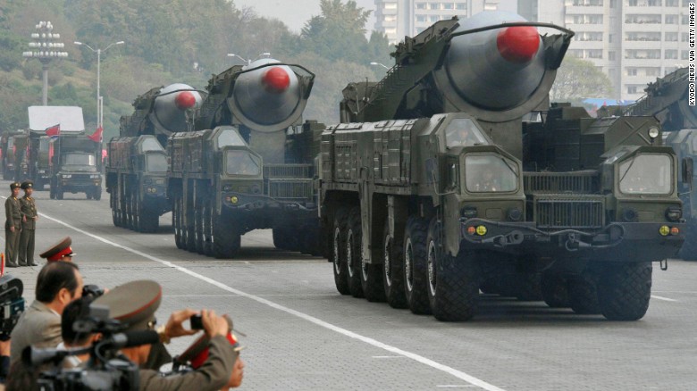 Trucks transport what appear to be North Korea&#39;s Musudan intermediate-range ballistic missiles at a military parade in Pyongyang on October 10, 2010.