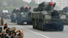 Trucks transport what appear to be North Korea's Musudan intermediate-range ballistic missiles at a military parade in Pyongyang on October 10, 2010.