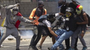 Violence at parade highlights escalating Venezuela protests 