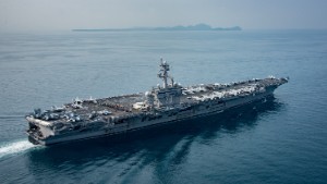 170415-N-BL637-044 SUNDA STRAIT (April 15, 2017) The aircraft carrier USS Carl Vinson (CVN 70) transits the Sunda Strait. The Carl Vinson Carrier Strike Group is on a scheduled western Pacific deployment as part of the U.S. Pacific Fleet-led initiative to extend the command and control functions of U.S. 3rd Fleet. U.S Navy aircraft carrier strike groups have patrolled the Indo-Asia-Pacific regularly and routinely for more than 70 years. (U.S. Navy photo by Mass Communication Specialist 2nd Class Sean M. Castellano/Released)