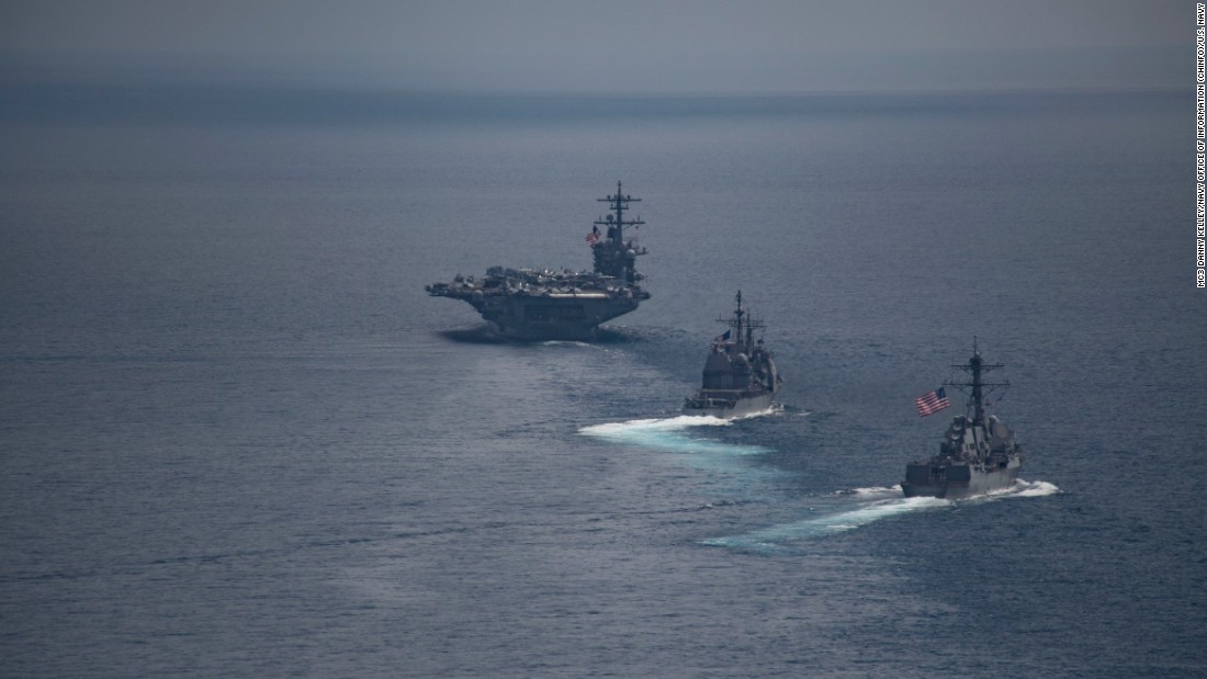 The aircraft carrier USS Carl Vinson leads the guided-missile destroyer USS Michael Murphy and the guided-missile cruiser USS Lake Champlain in the Indian Ocean on April 14.
