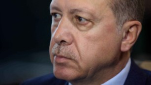 Erdogan denies dictator charges