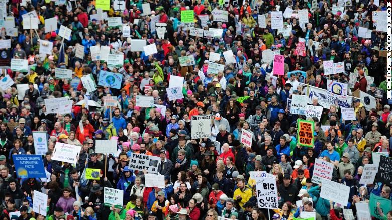 Thousands of protesters fill Tom McCall Waterfront Park during the March for Science in Portland, Oregon, on Saturday, April 22. Protests were held in cities around the world against President Donald Trump's policies. 