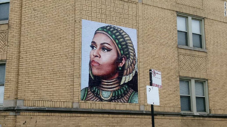 The mural is on a building a few blocks from where Michelle Obama grew up.