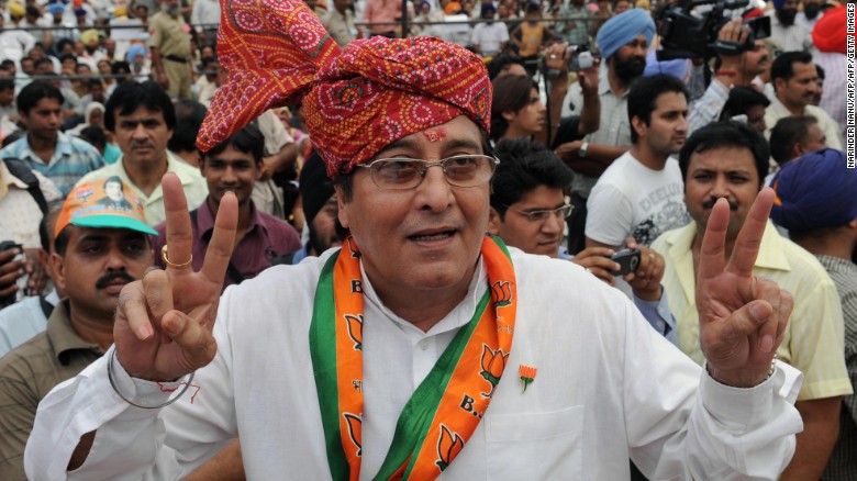 Vinod Khanna makes a victory sign during an election campaign rally on the outskirts of Gurdaspur, India.