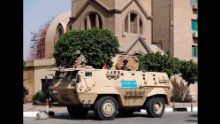 An Egyptian army vehicle is stationed outside of St. Mark's Coptic Orthodox Cathedral in central Cairo. The Pope's visit comes nearly three weeks after the Palm Sunday bombing of two Coptic churches, brazen strikes that left at least 45 people dead.
