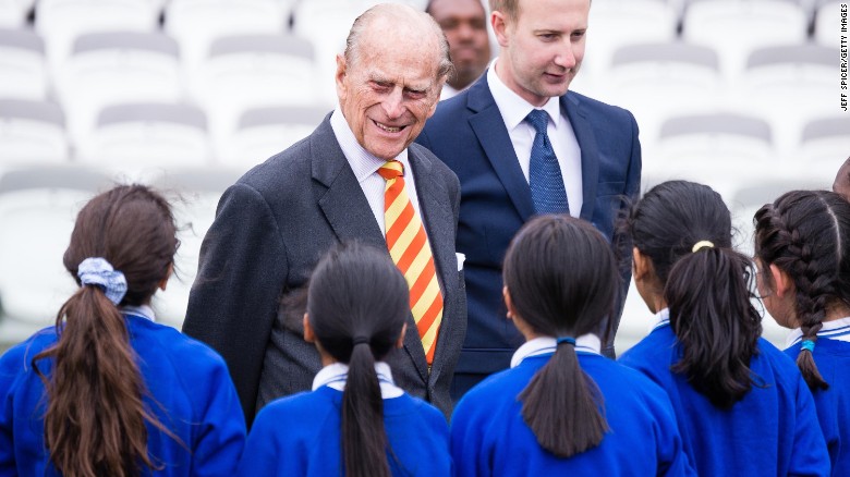 Prince Philip speaks to school children while opening the new stand at Lord&#39;s cricket ground.