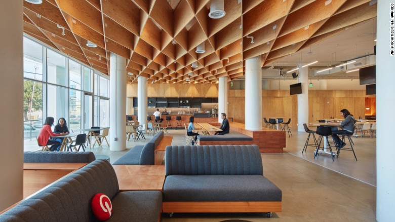 The San Francisco design for Pinterest&#39;s new headquarters was formerly a John Deere factory. A diagrid waffle ceiling made from plywood acts as a canopy above spaces used for public events and programs.