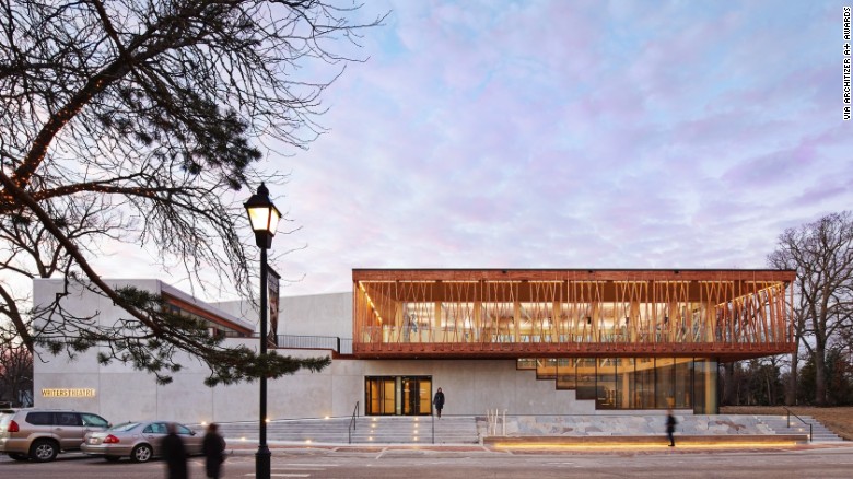 Built in 2016, Chicago-based Studio Gang Architects&#39; design for the Writers Theatre in Glencoe, Illinois, uses timber trusses and a wooden lattice to support a second-floor gallery walk.