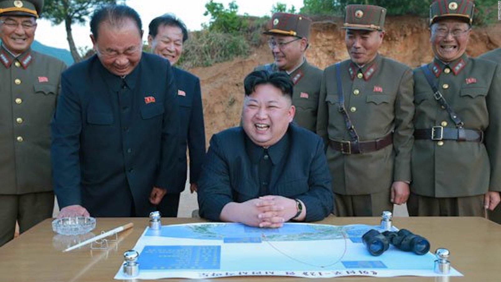 North Korean leader Kim Jong Un surrounded by officials on the day of the May 14 missile launch.