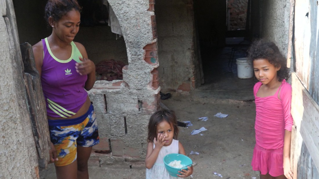 The Dias family welcomed us to their home, as Jennifer ate their first rice in a week.