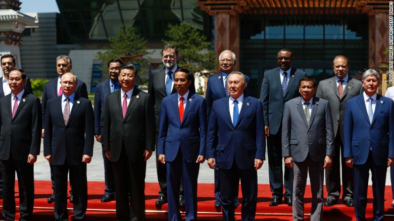 Russian President Vladimir Putin, Chinese President Xi Jinping and other world leaders pose for a group photo at the Belt and Road Forum in Beijing. 