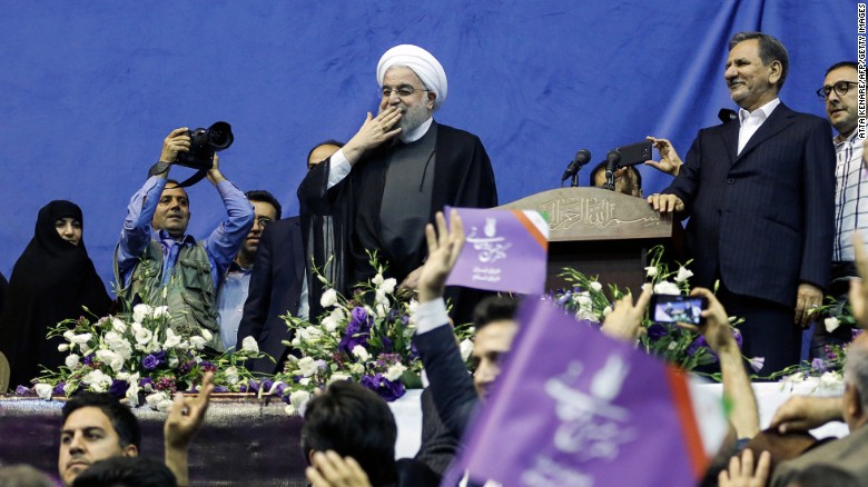 Rouhani attends a campaign event in Tehran in May.