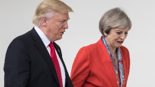 Facing fuming British prime minister, Trump vows to plug leaks
