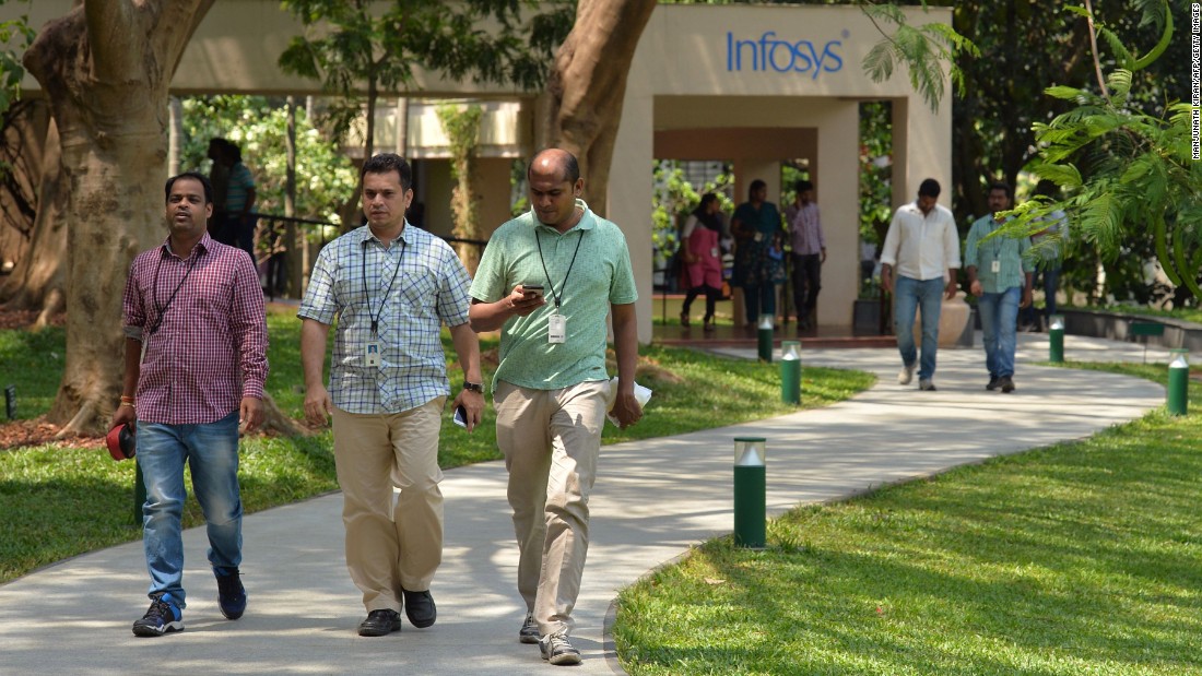 Employees on the Bangalore, India, campus of Infosys, a tech giant that is one of the top recipients of H-1B visas.