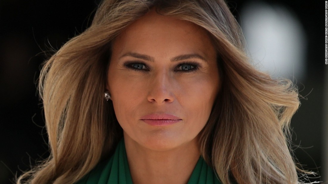 melania trump with downcast face