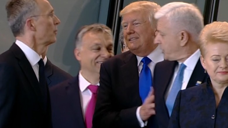 Image result for Trump pushes the prime minister