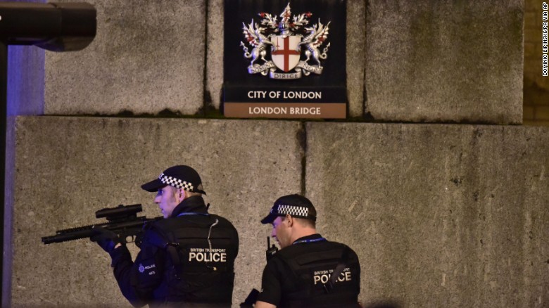 An armed Police officer with his weapons on London Bridge.