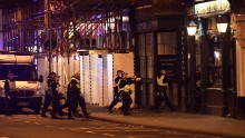 Armed police raid The Blue Eyed Maid on Borough High Street.