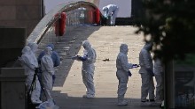 Forensic officers work at the scene of a terror attack at London Bridge in London on Sunday, June 4. At least seven people were killed in attacks late Saturday as a van mowed down pedestrians on London Bridge before attackers then stabbed victims at nearby Borough Market.