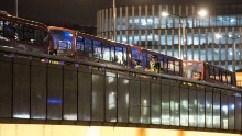 Police carry out a search near empty buses on London Bridge, Saturday, June 3.