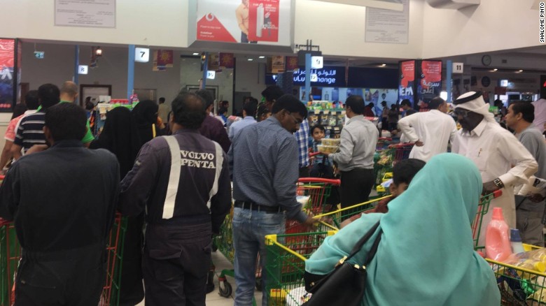 Qatar residents rushed to supermarkets following news the country&#39;s only land border was being closed. 