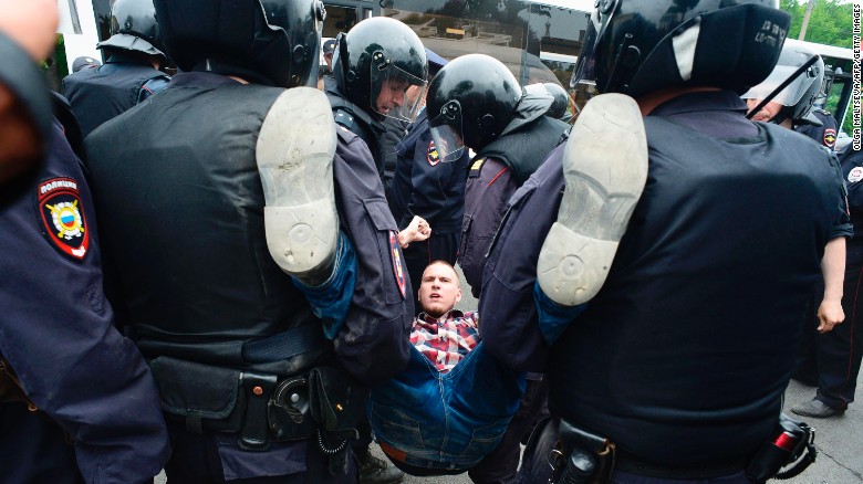 Police arrest a protester in St Petersburg.