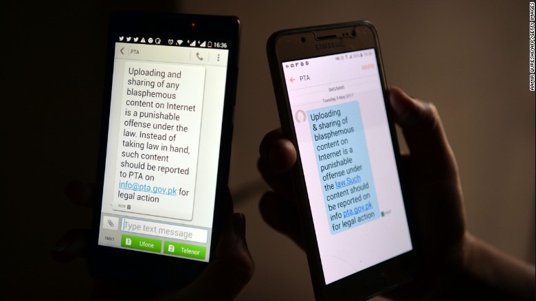 Pakistani cellphone users reads a text message circulated by the Pakistan Telecommunication Authority on May 10.
