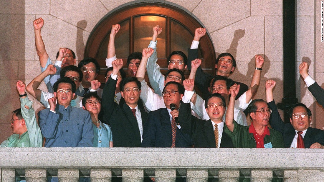 Directly elected lawmakers addressed a crowd from a balcony of the city&#39;s parliament on July 1, 1997. The flames of democracy, they promised, would never be &quot;snuffed out.&quot;