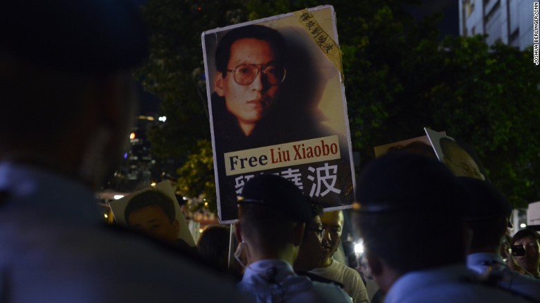 A protester holds up a picture of Chinese dissident Liu Xiaobo in Hong Kong.