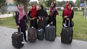 Members of a female robotics team arrive from Herat province to receive visas from the U.S. embassy, at the Hamid Karzai International Airport, in Kabul, Afghanistan, Thursday, July 13, 2017.